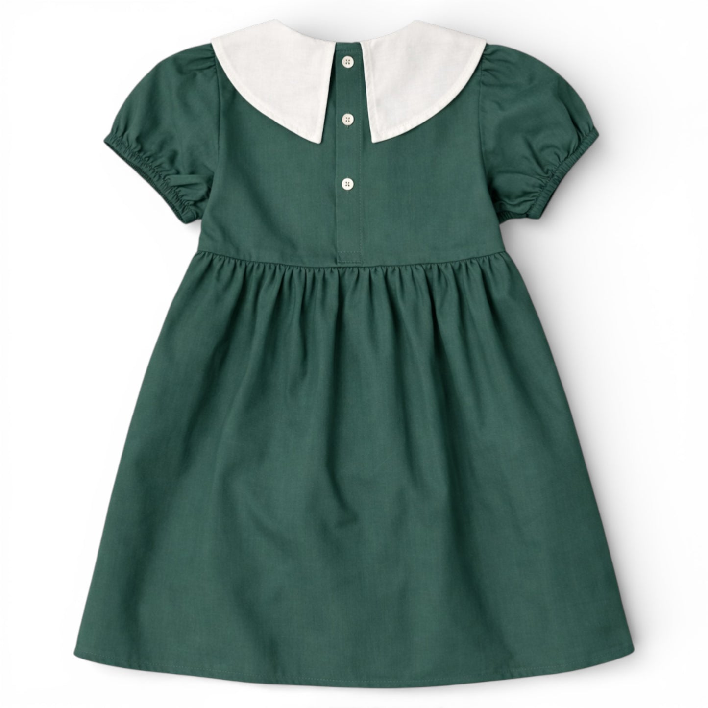 Back view of green cotton empire line smock dress with Peter Pan collar