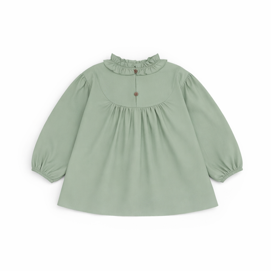 Back view of Riva Blouse showing button fastening