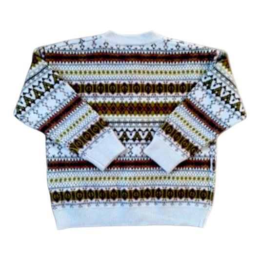 Back view of the Wilfried Cardigan showing square silhouette and all-over patterned knit