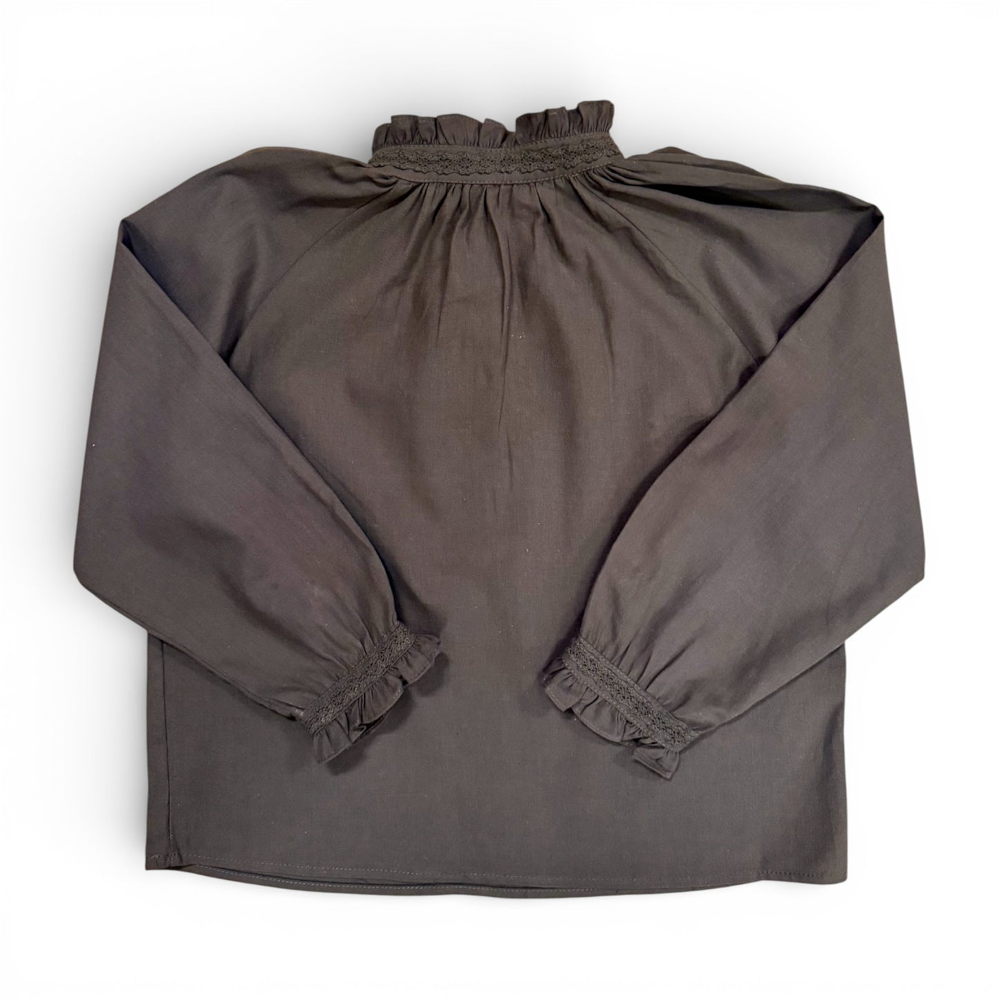 Back view of Etta Blouse in slate grey showing loose volume and gathered neckline
