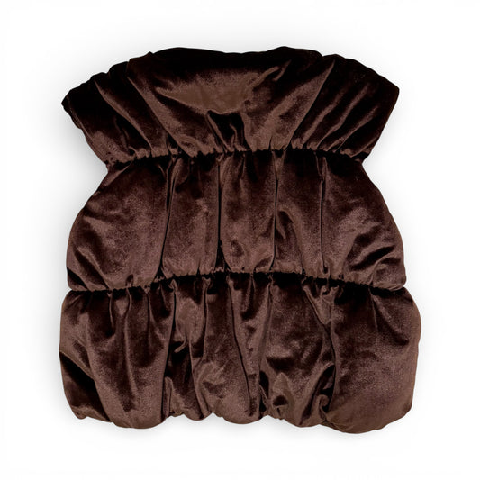 Back view of Ida Gilet highlighting three-tier shape and clean shoulder line