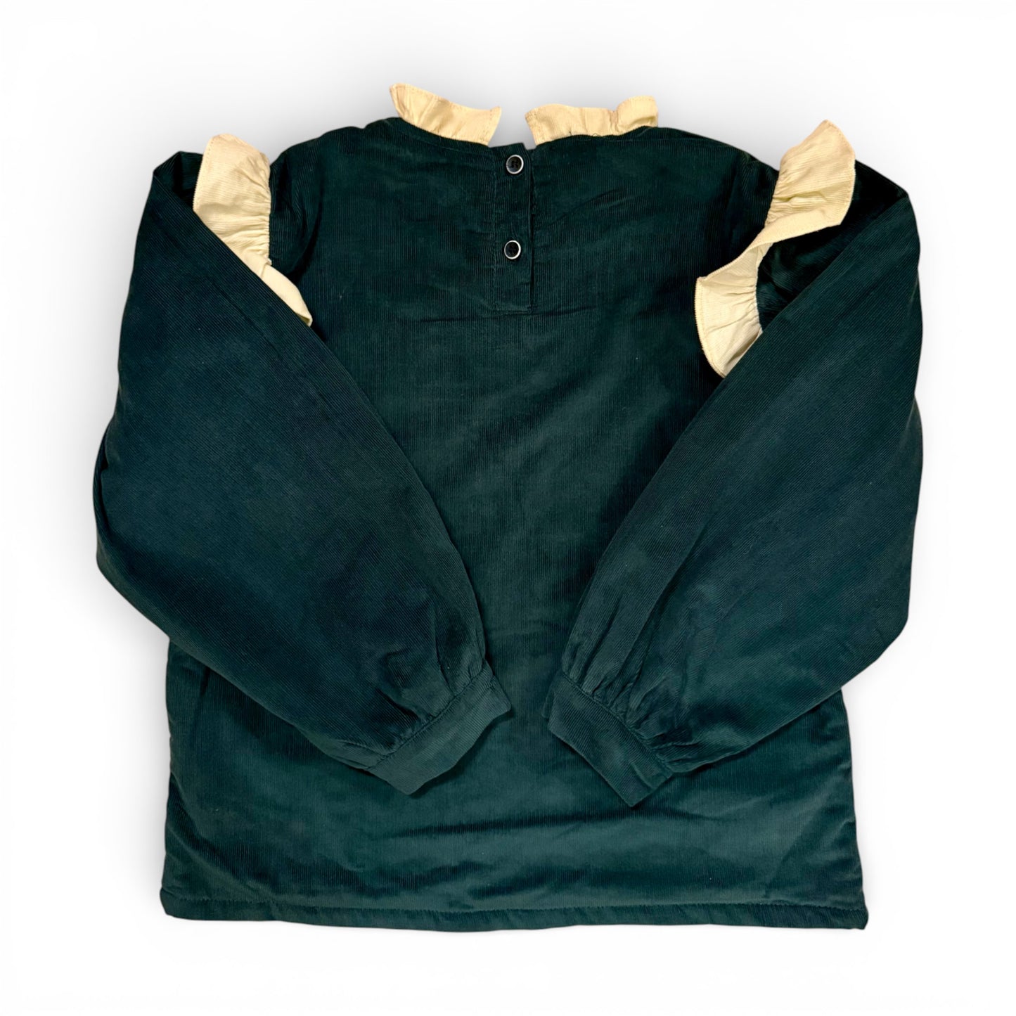 Back view of girls microcorduroy blouse with button fastening and frilled collar
