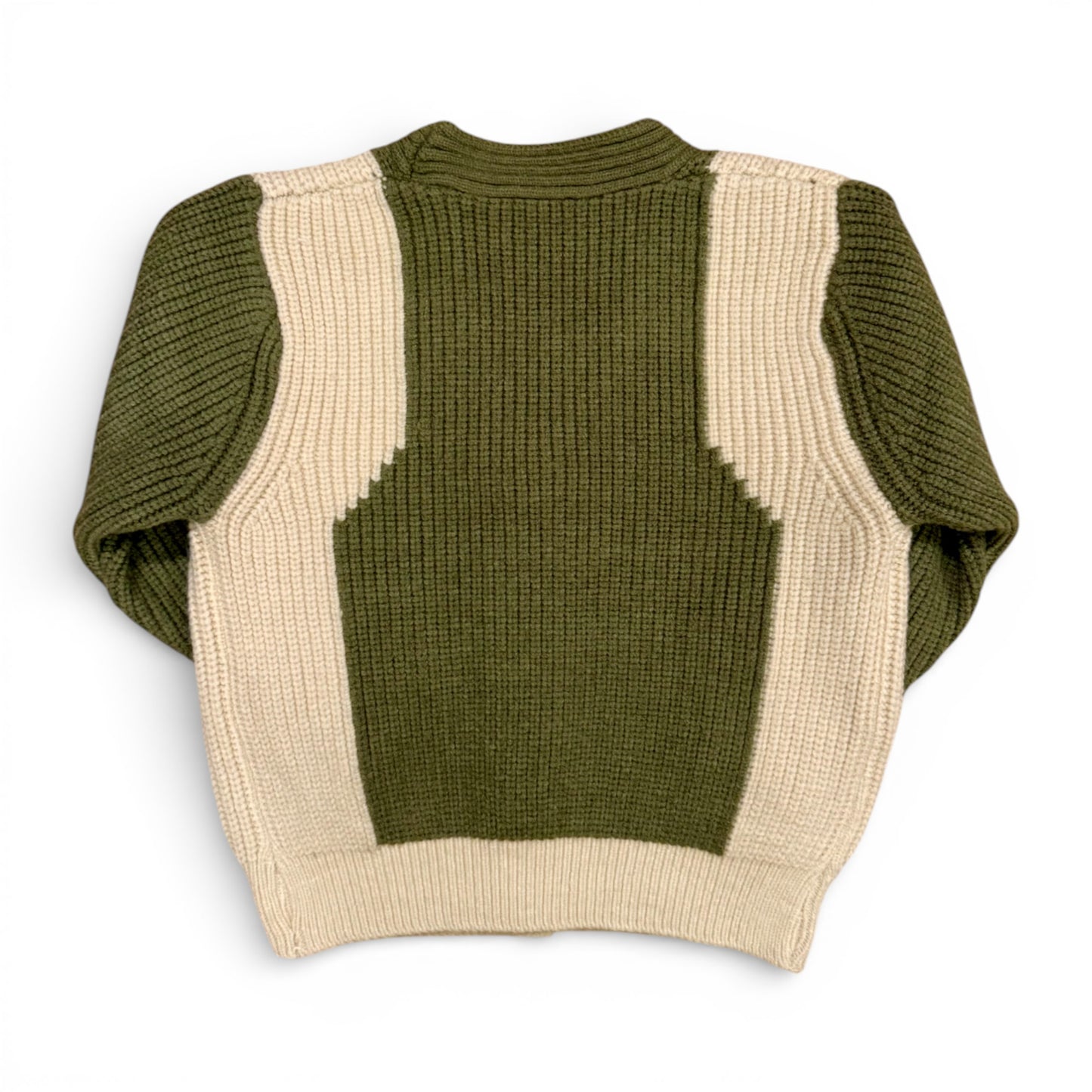 Detail of contrast knit panels on olive green children’s jumper