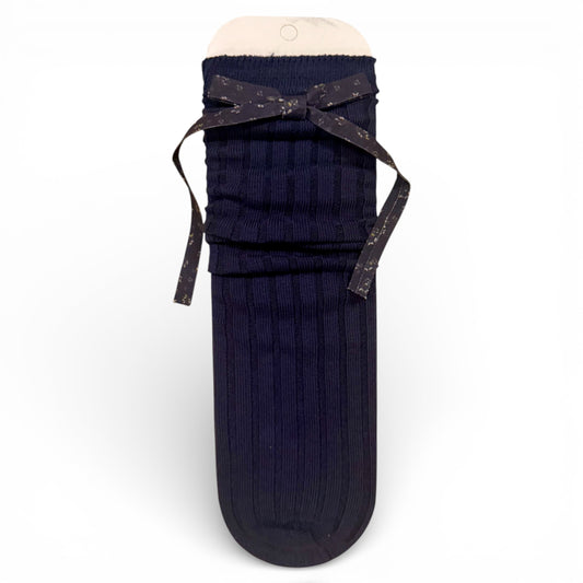 Ribbed children’s sock with cotton paisley bow detail, un-heeled design