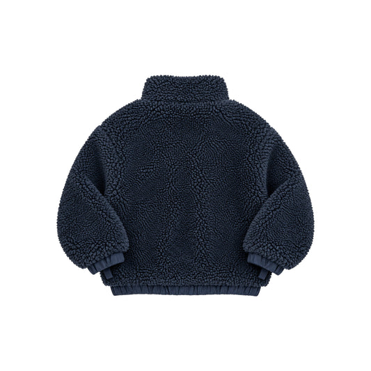 A navy blue sherpa fleece jacket shown from the back, featuring a high collar, long sleeves, and ribbed cuffs and hem, photographed on a solid white background.