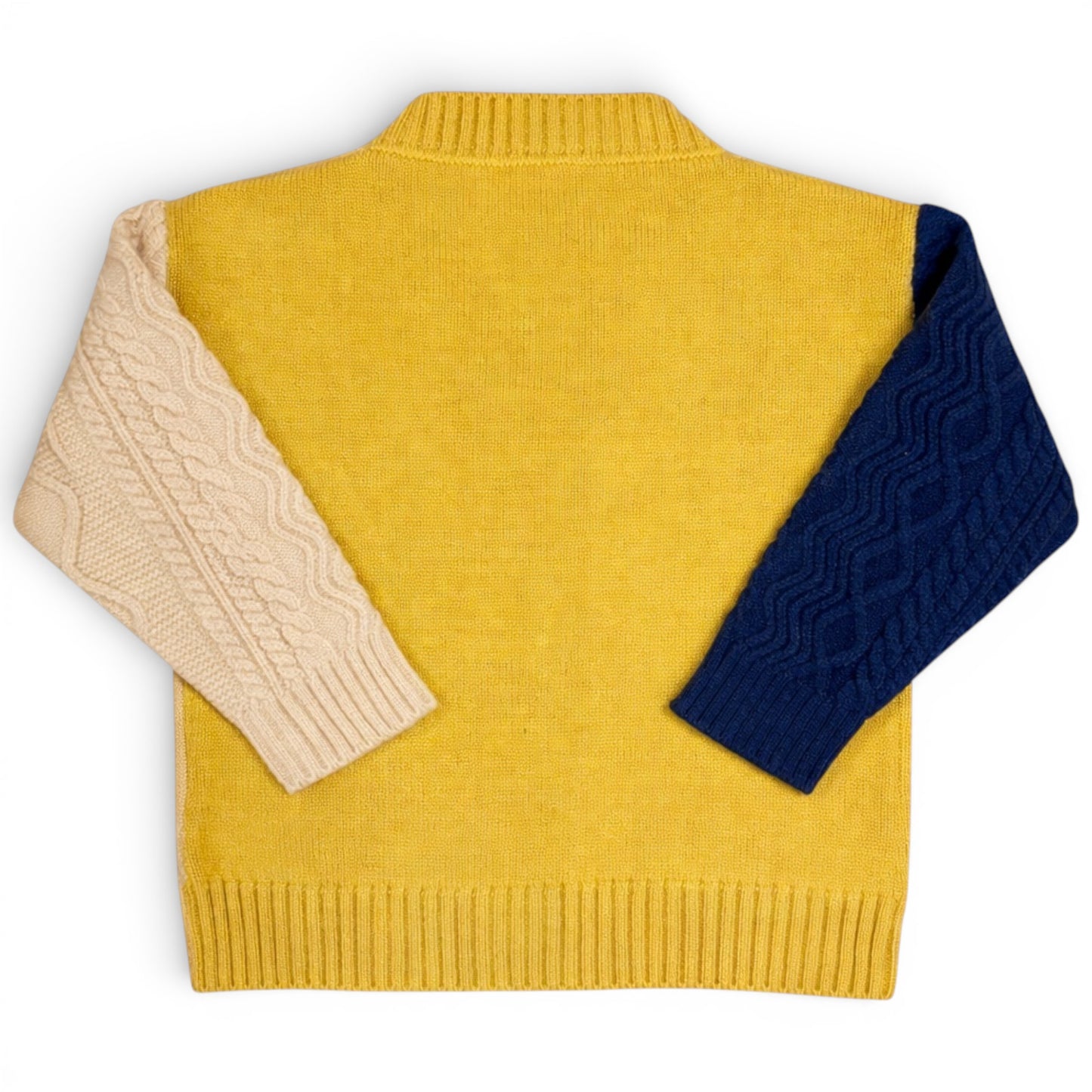 Children’s remnant knit cardigan with cable knit sleeves, plain knit body and ribbed trims by That’s Not Fair London