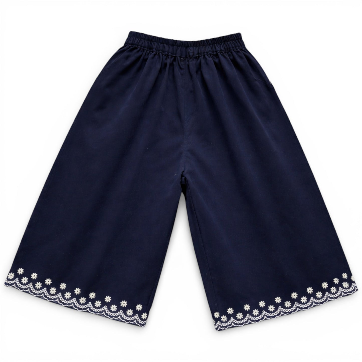 Navy children’s cropped culotte trousers with wide leg and embroidered scalloped hem by That’s Not Fair London