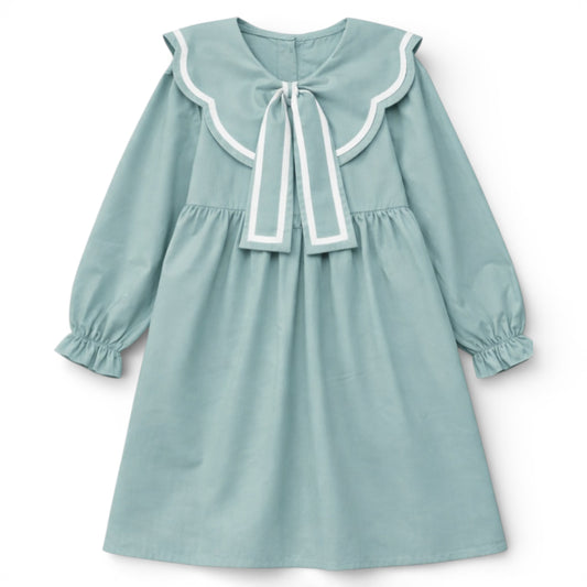 Empire line girls dress with scalloped contrast collar and bow detail by That’s Not Fair London.
