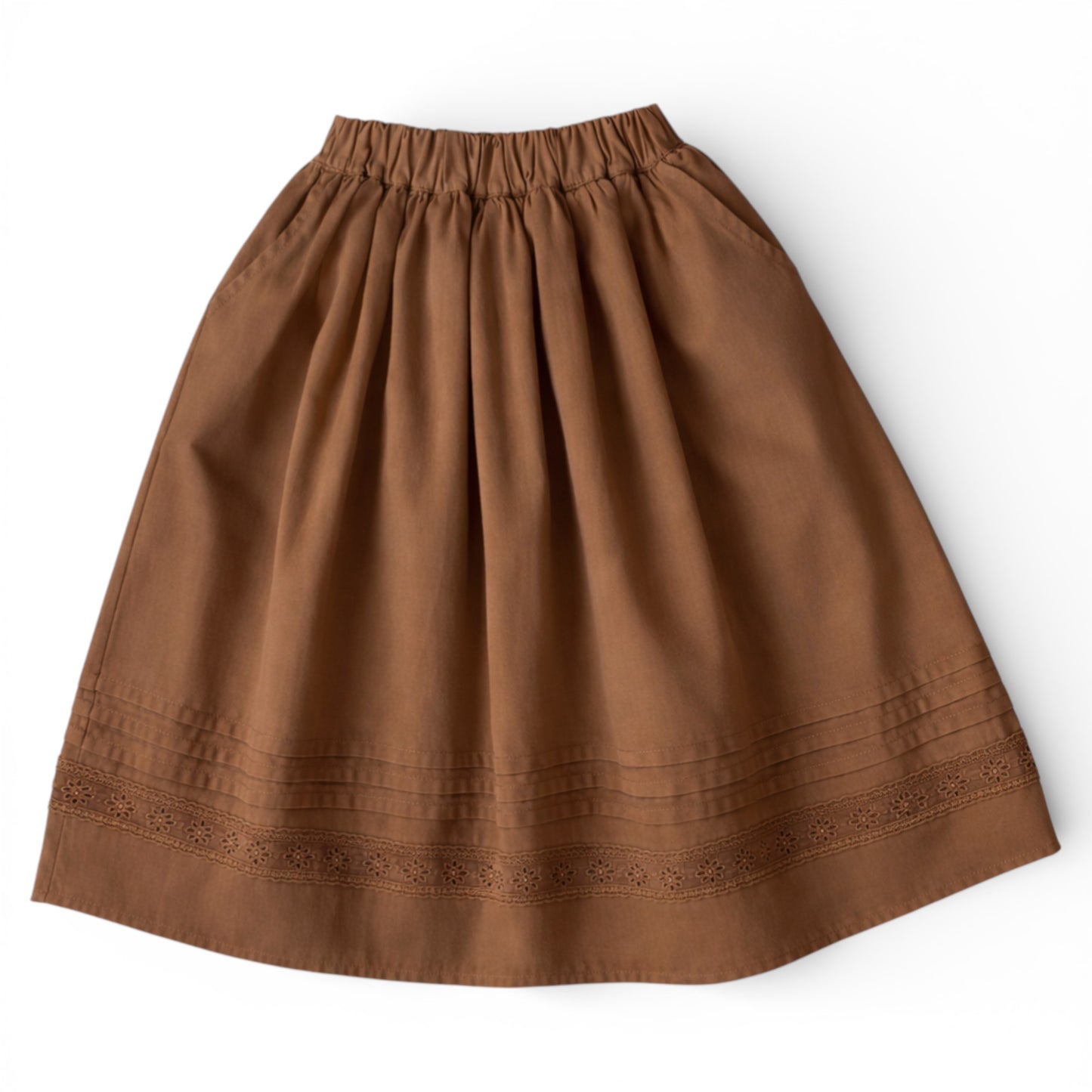 Girls tea‑length brown cotton A‑line skirt with slant pockets and eyelet hem