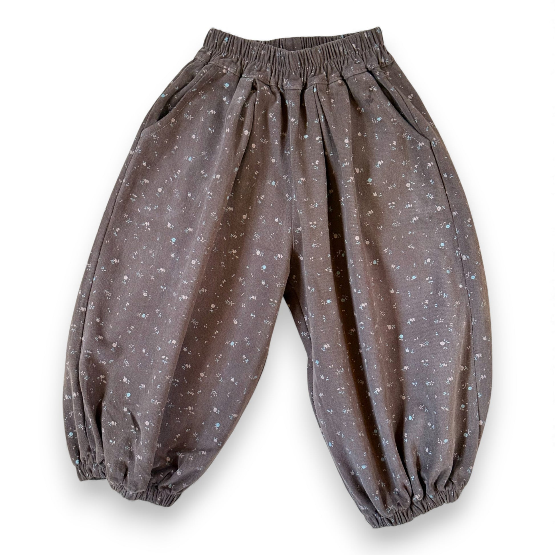 Brown children’s cotton pantaloons by That’s Not Fair London with straight-leg cut and elasticated waistband