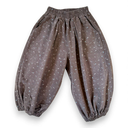 Brown children’s cotton pantaloons by That’s Not Fair London with straight-leg cut and elasticated waistband