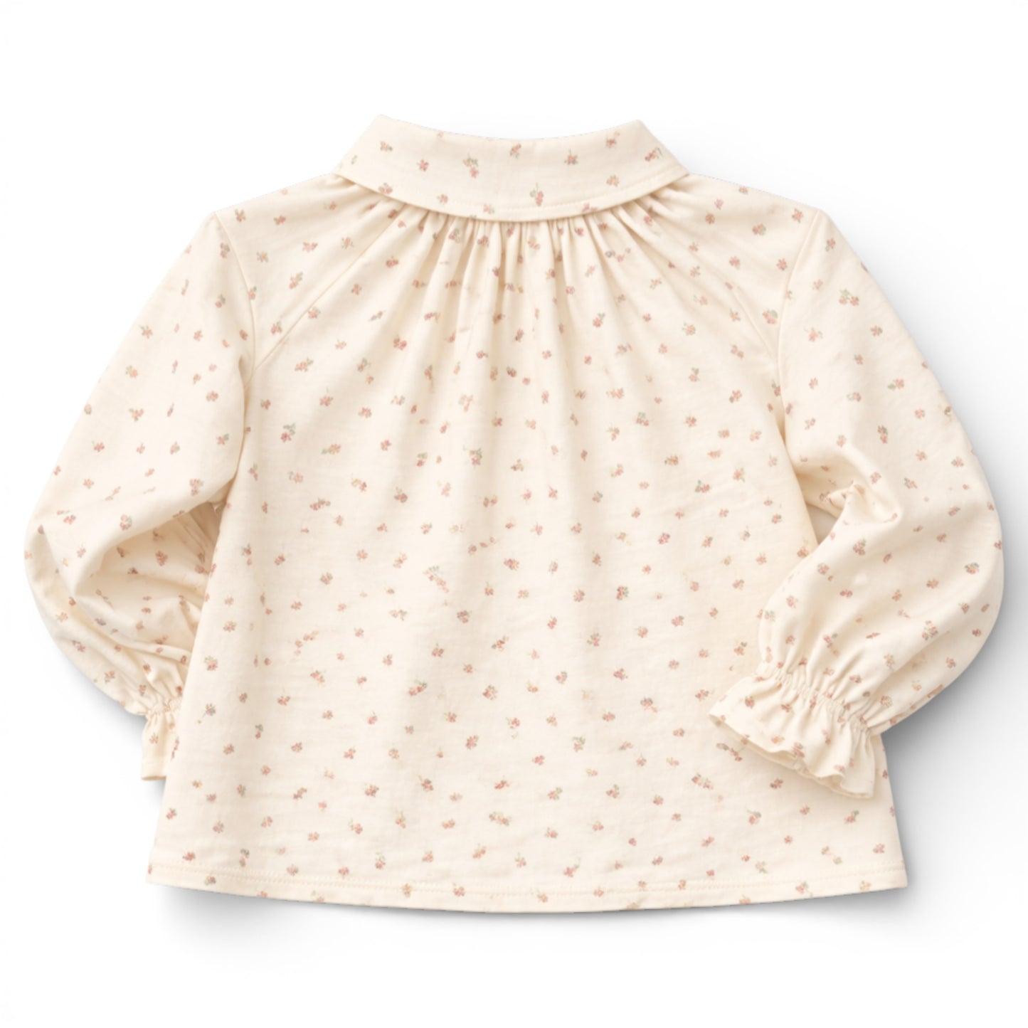 Brushed cotton children’s blouse with slim Peter Pan collar, button front, Raglan sleeve with frilled cuff details.
