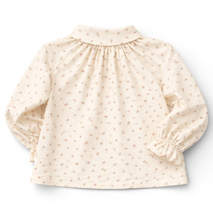 Brushed cotton children’s blouse with slim Peter Pan collar, button front, Raglan sleeve with frilled cuff details.
