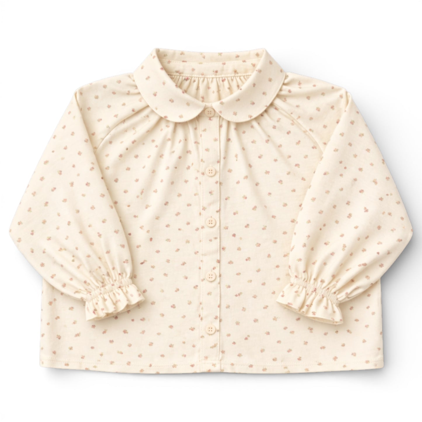 Brushed cotton children’s blouse with slim Peter Pan collar, button front, Raglan sleeve with frilled cuff details.