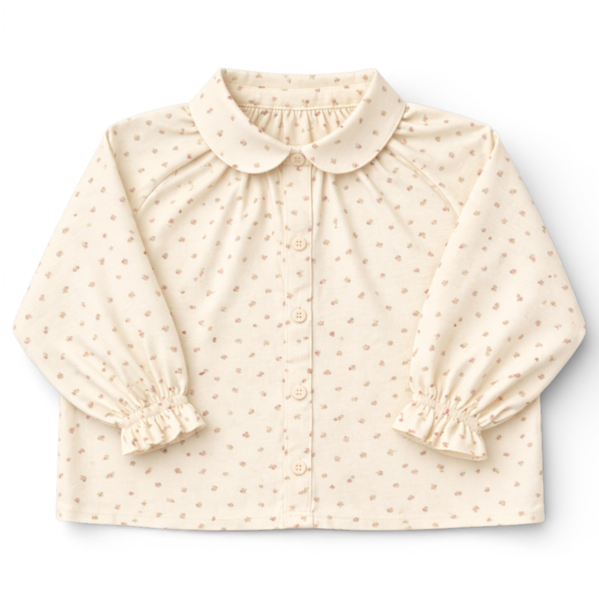 Brushed cotton children’s blouse with slim Peter Pan collar, button front, Raglan sleeve with frilled cuff details.