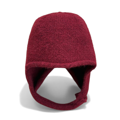 Burgundy wool children’s hat with ear coverage and under-chin strap — front view.