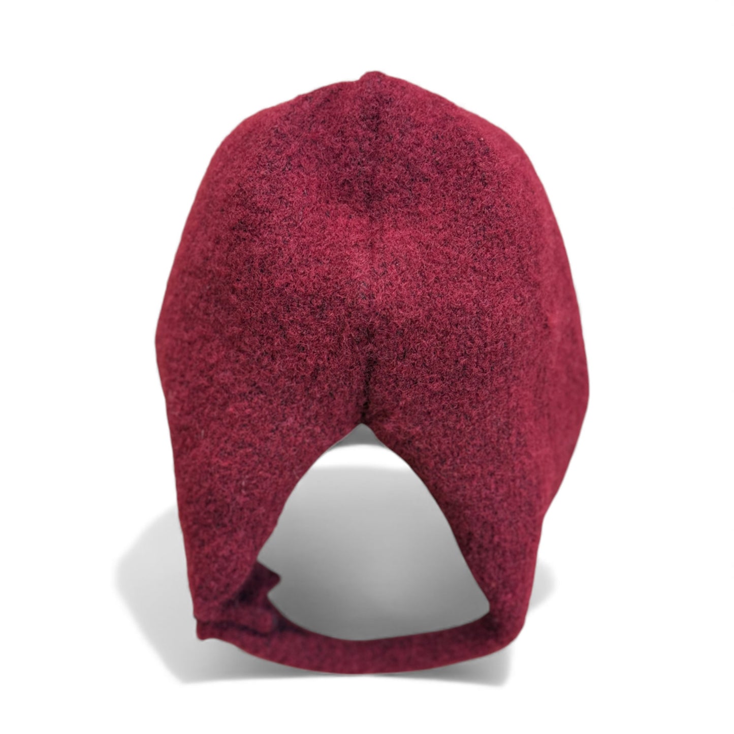 Burgundy wool children’s hat with close curved fit — back view.