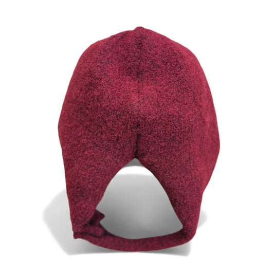 Burgundy wool children’s hat with close curved fit — back view.
