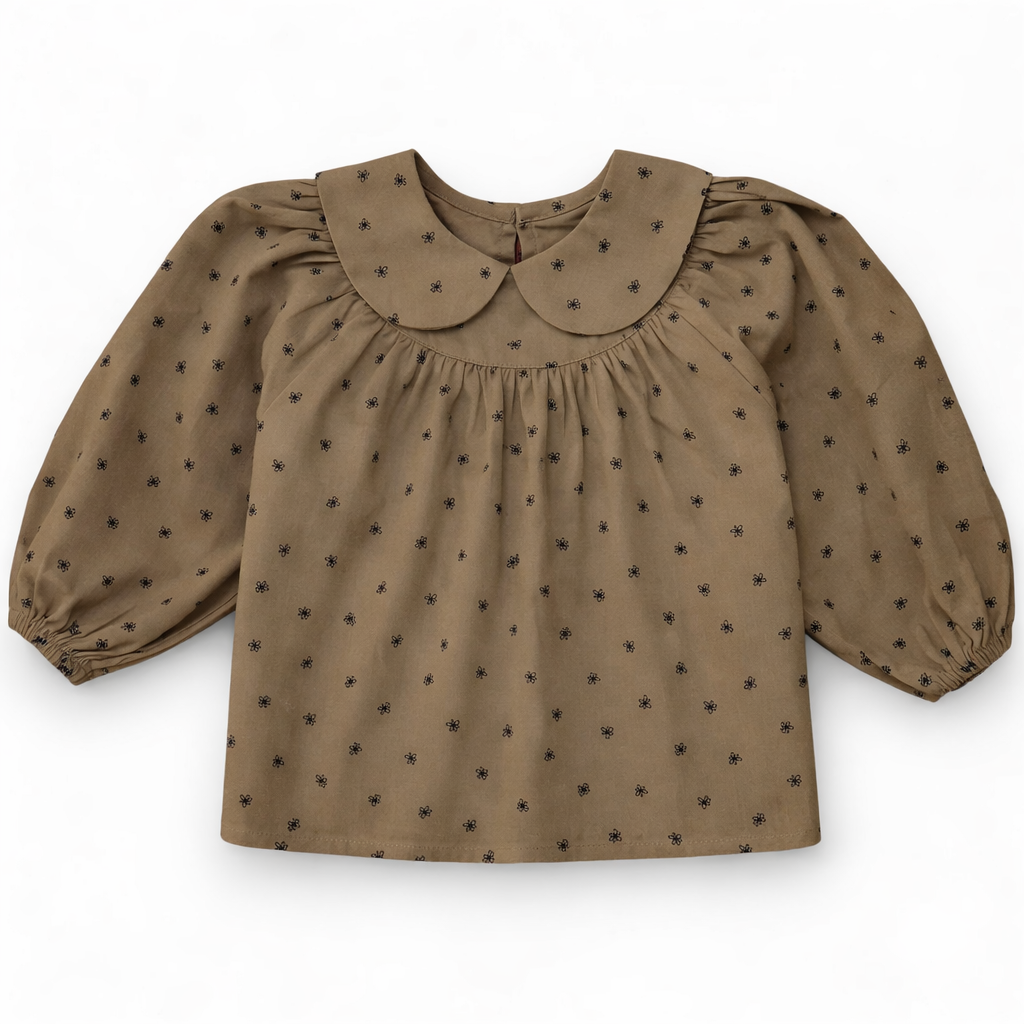 Children’s blouse with Peter Pan collar, gathered neckline and wide raglan sleeves