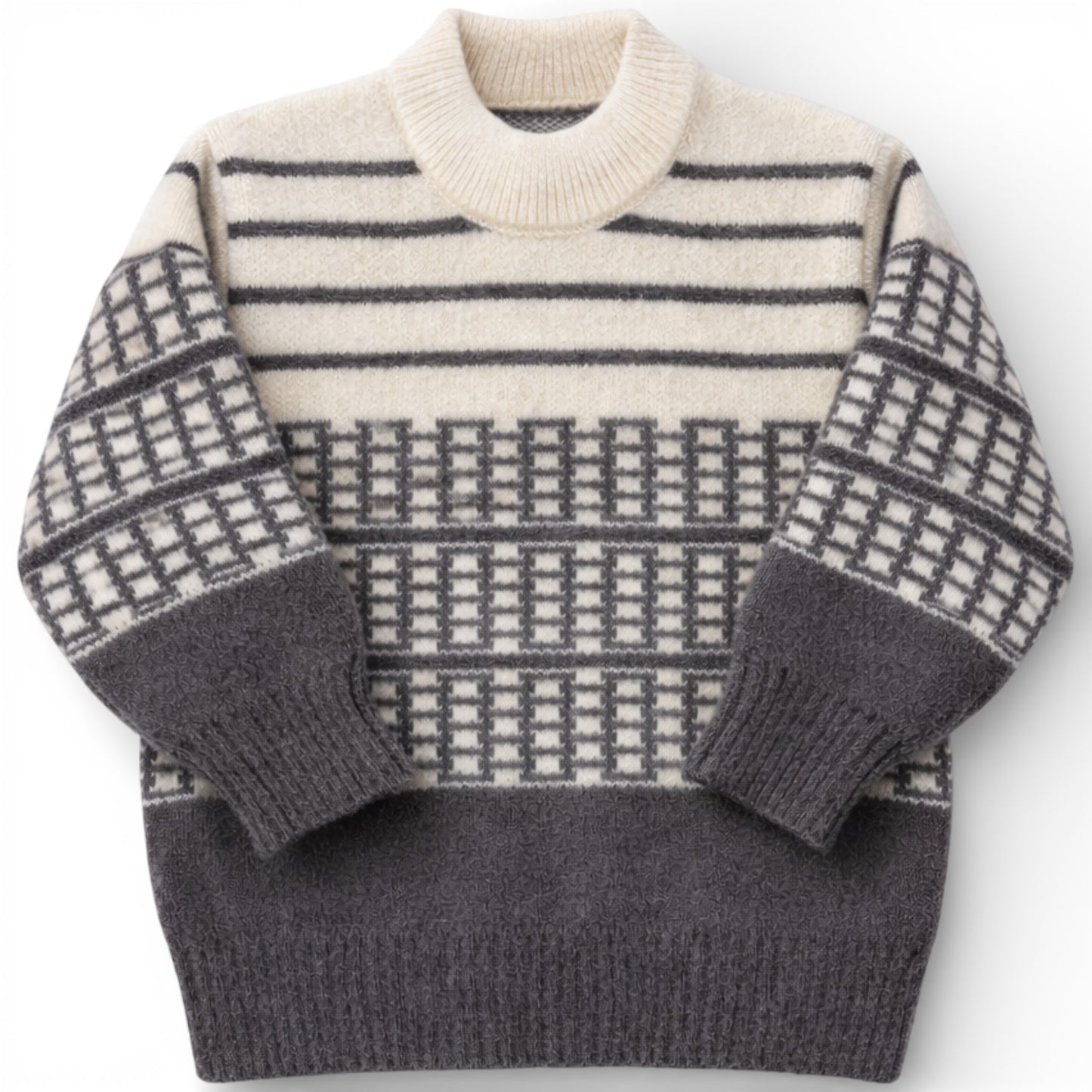 Children’s patterned knit jumper with drop shoulder and slight turtle neck.