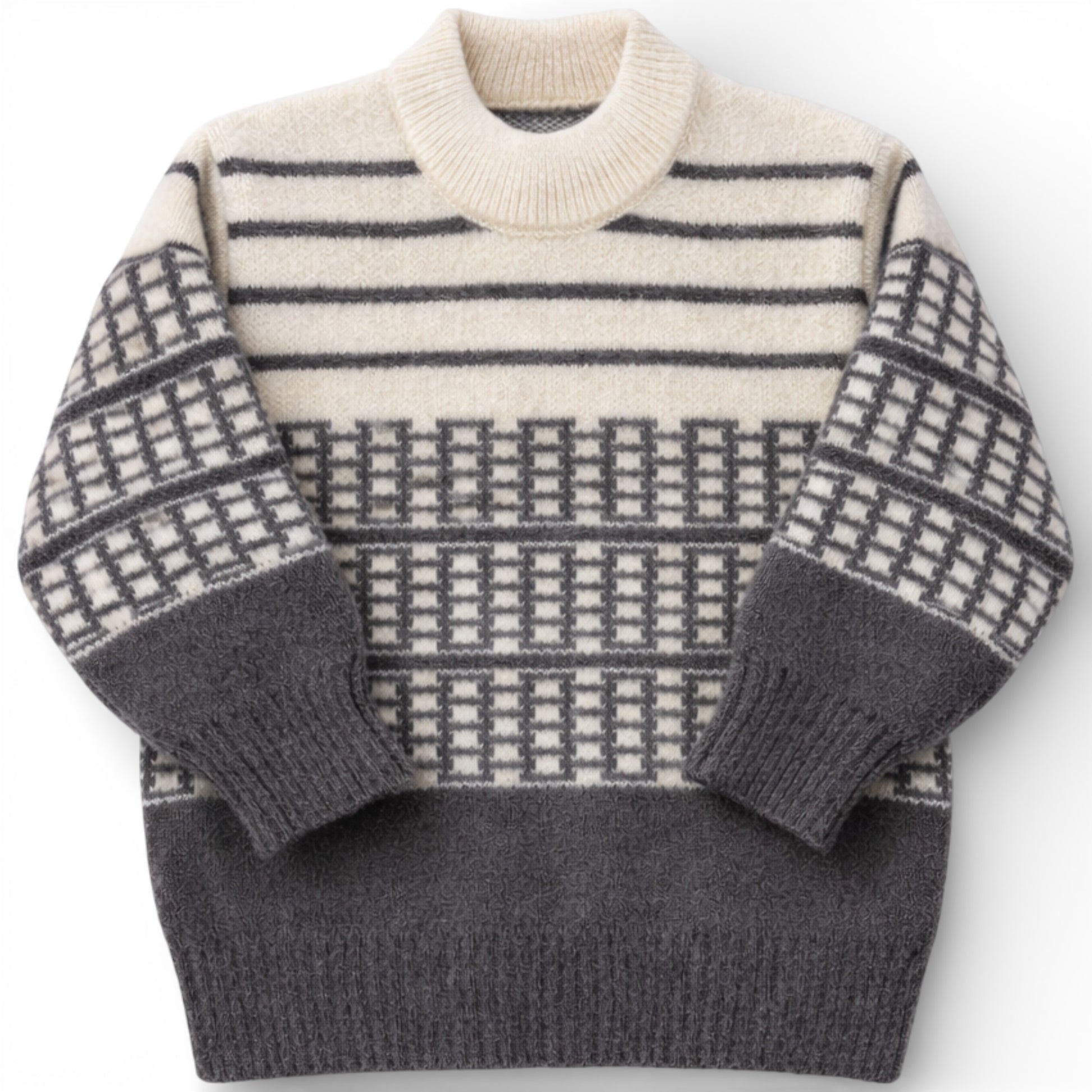 Children’s patterned knit jumper with drop shoulder and slight turtle neck.