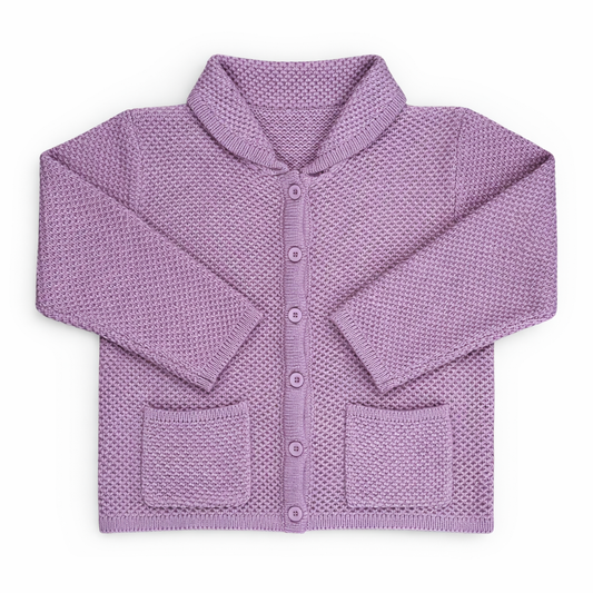 Children’s waffle-knit cardigan with drop sleeves, Peter Pan collar, button front and patch pockets, photographed flat on a white background.