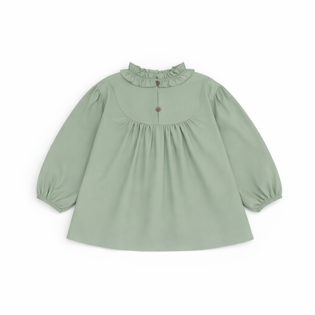 Back view of Riva Blouse showing button fastening