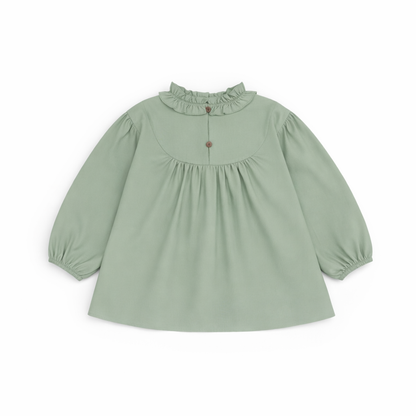 Back view of Riva Blouse showing button fastening