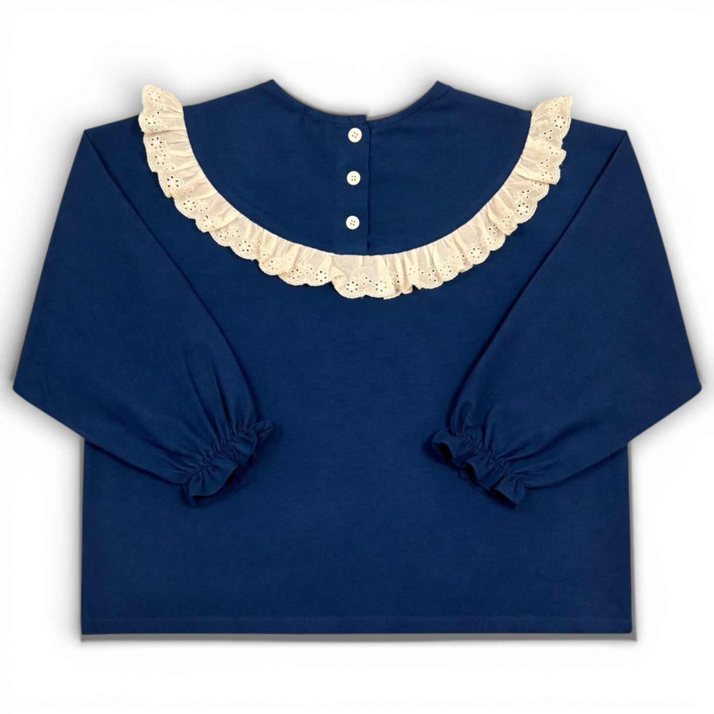 Navy children’s blouse with frilled lace collar, boxy fit and elasticated sleeve cuffs by That’s Not Fair London