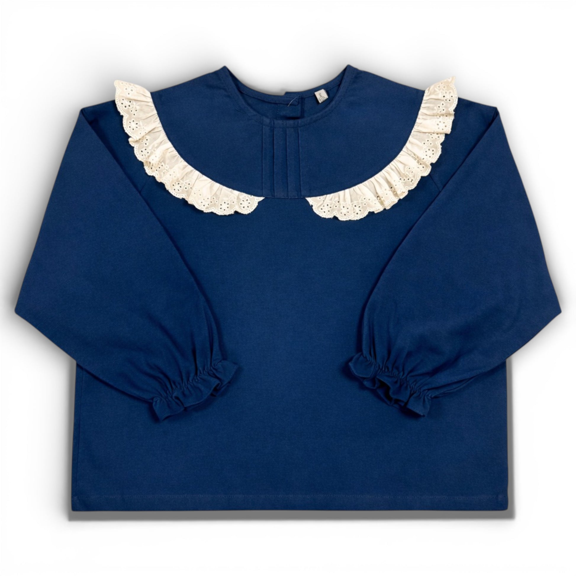 Navy children’s blouse with frilled lace collar, boxy fit and elasticated sleeve cuffs by That’s Not Fair London