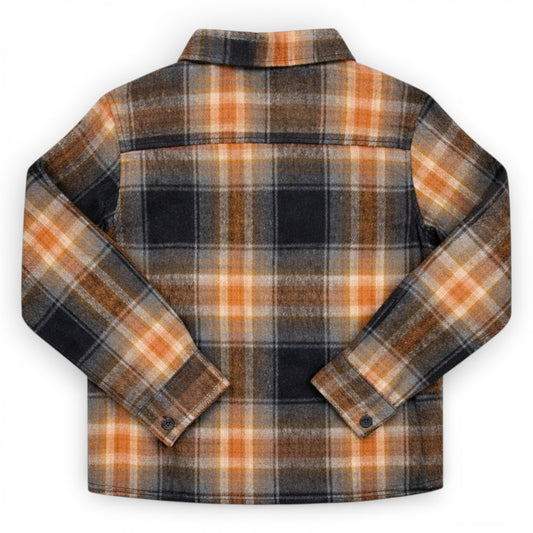 Children’s check flannel lumberjack shirt with drop shoulders and popper fastenings by That’s Not Fair London