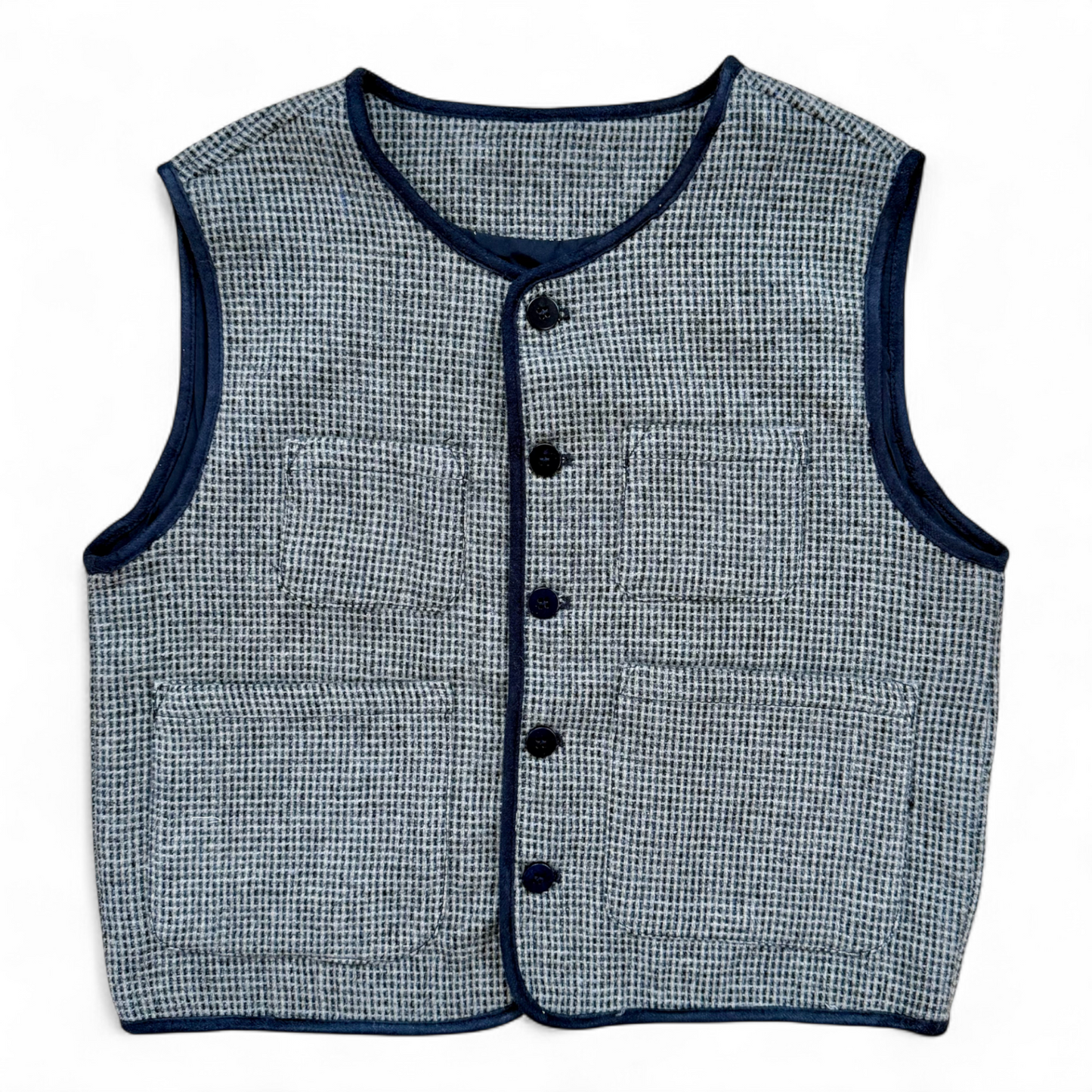 Children’s wool gilet in blue check with quilted cotton lining and patch pockets — front view.