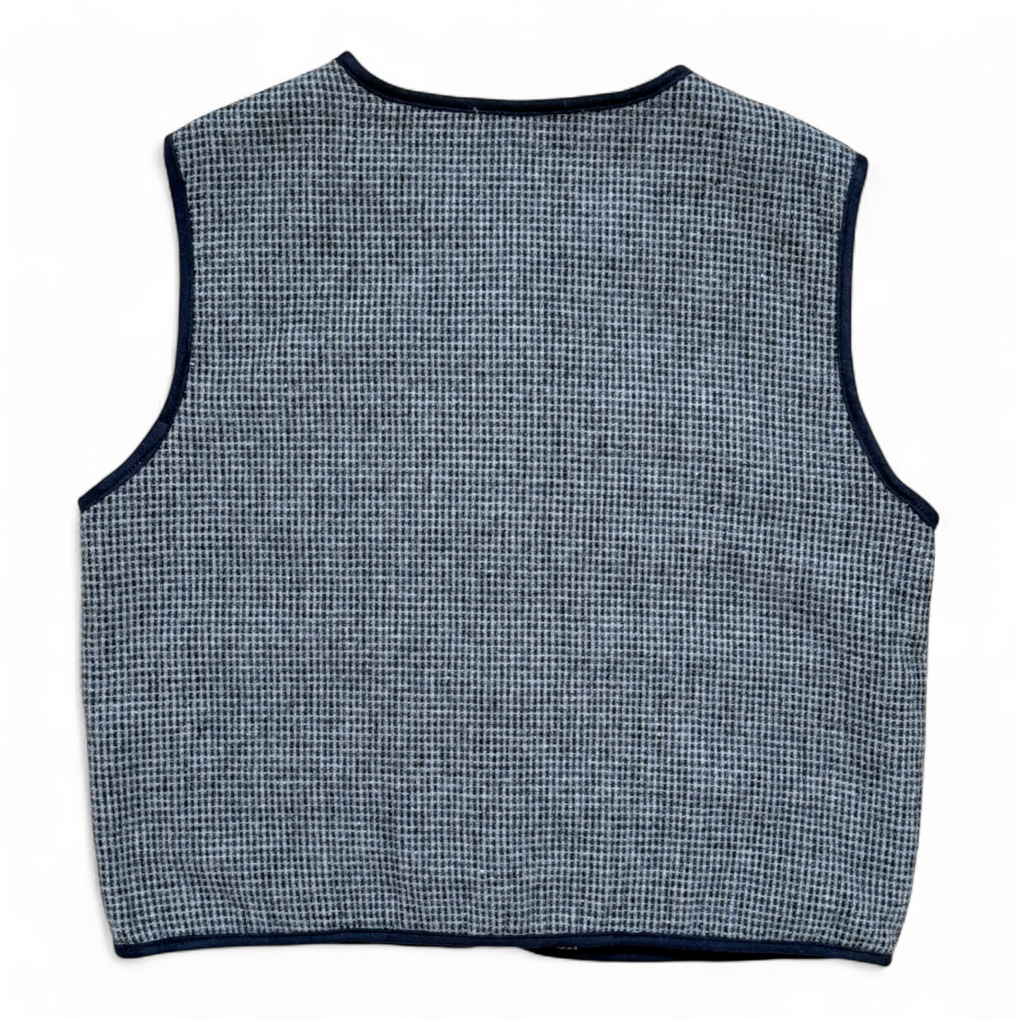Children’s wool gilet in blue check with quilted cotton lining and patch pockets — back view.