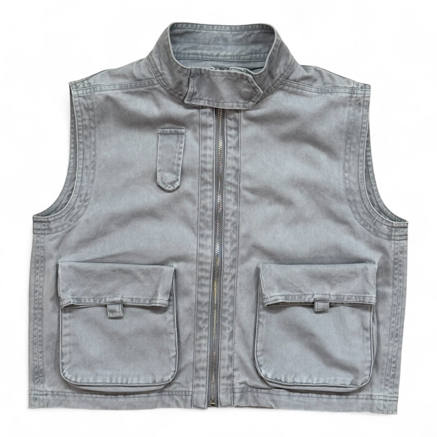 Soft grey washed-denim children’s gilet with high neck, zip front and oversized pockets by That’s Not Fair London