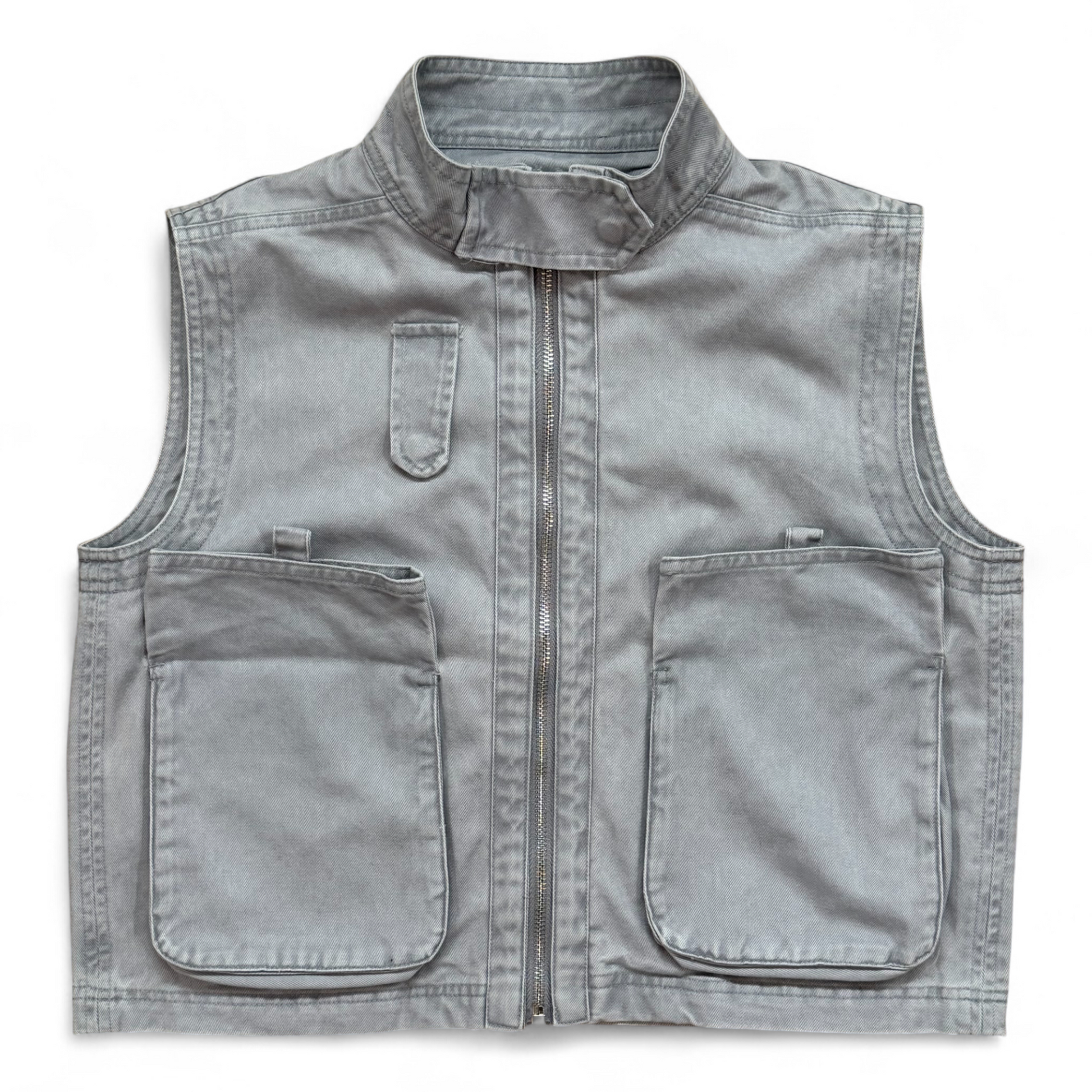 Close-up of washed-denim gilet pocket and stitching by That’s Not Fair London