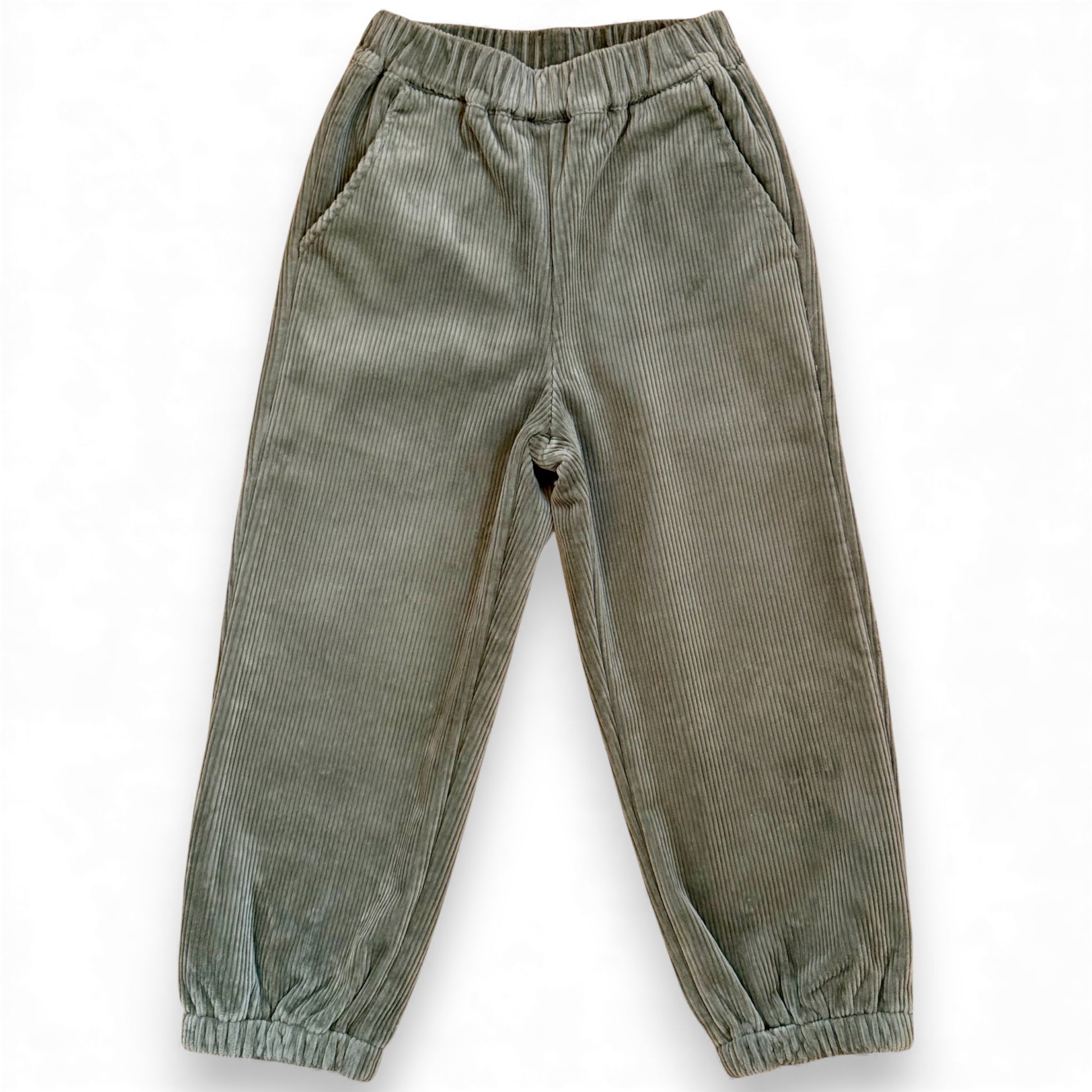 Green chunky corduroy children’s trousers with slim leg, elasticated cuffs and fleece lining by That’s Not Fair London