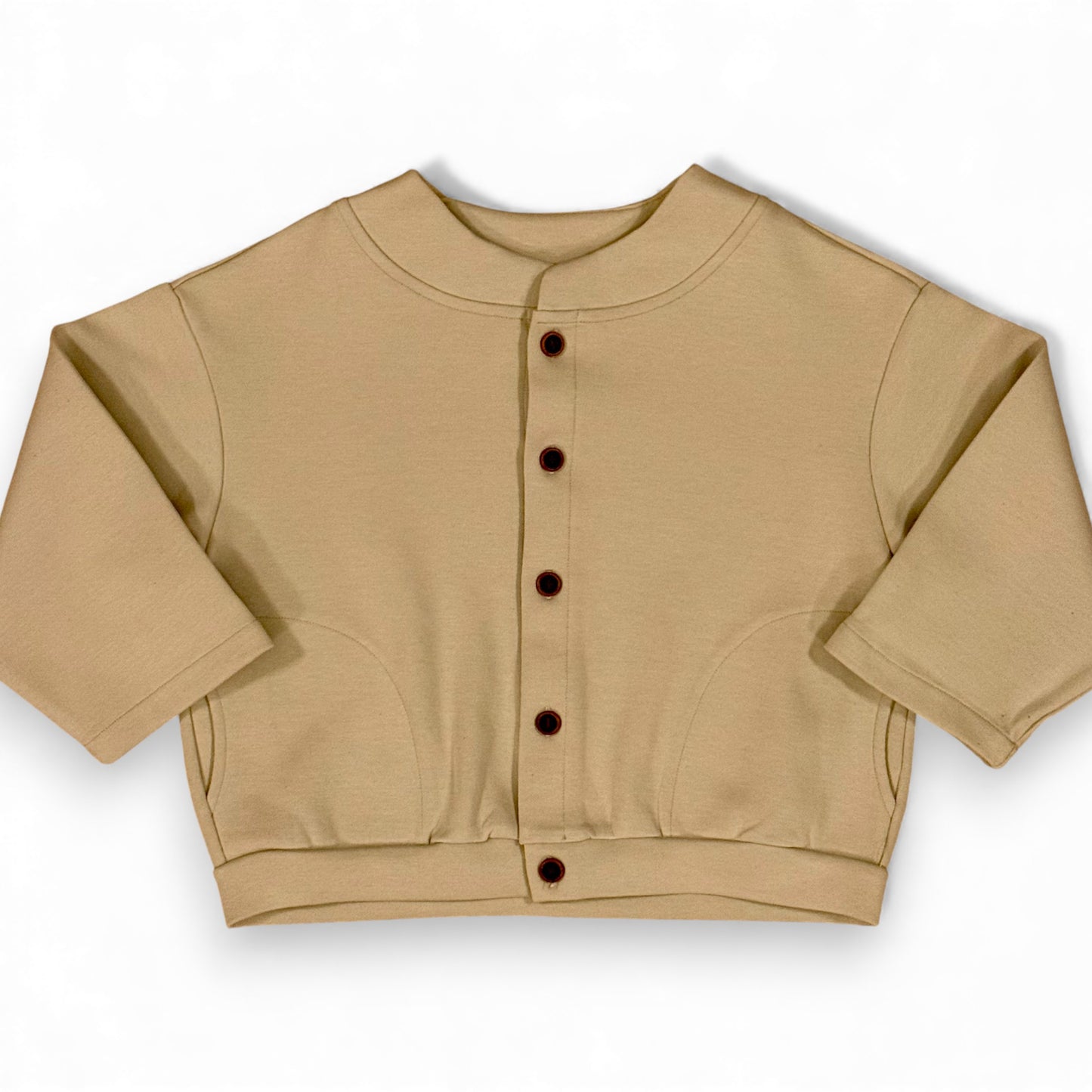 Folami Jacket in sand — front view, heavyweight cotton jersey with crescent pockets
