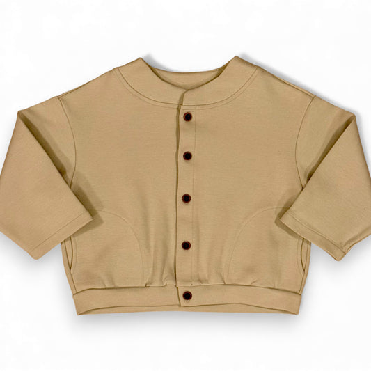 Folami Jacket in sand — front view, heavyweight cotton jersey with crescent pockets
