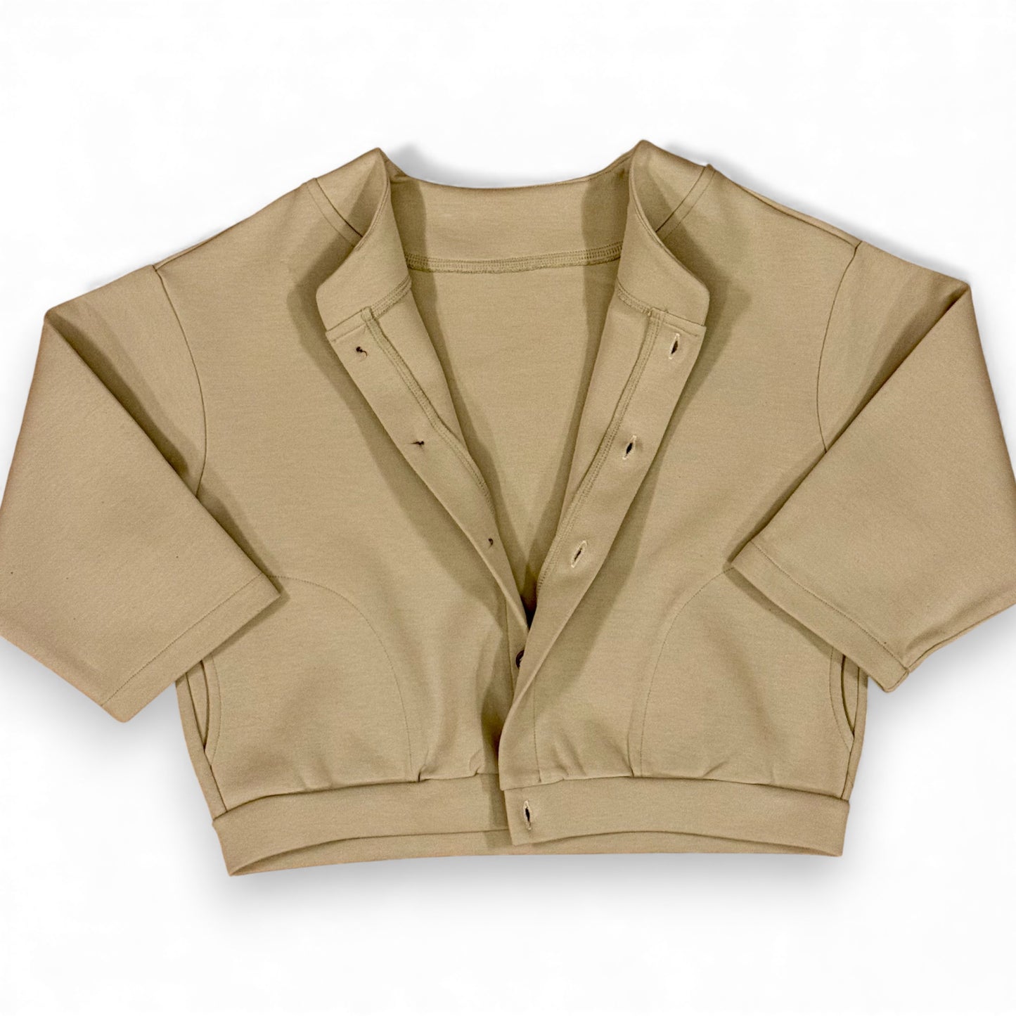 Folami Jacket in sand — back view with boxy silhouette and clean hem