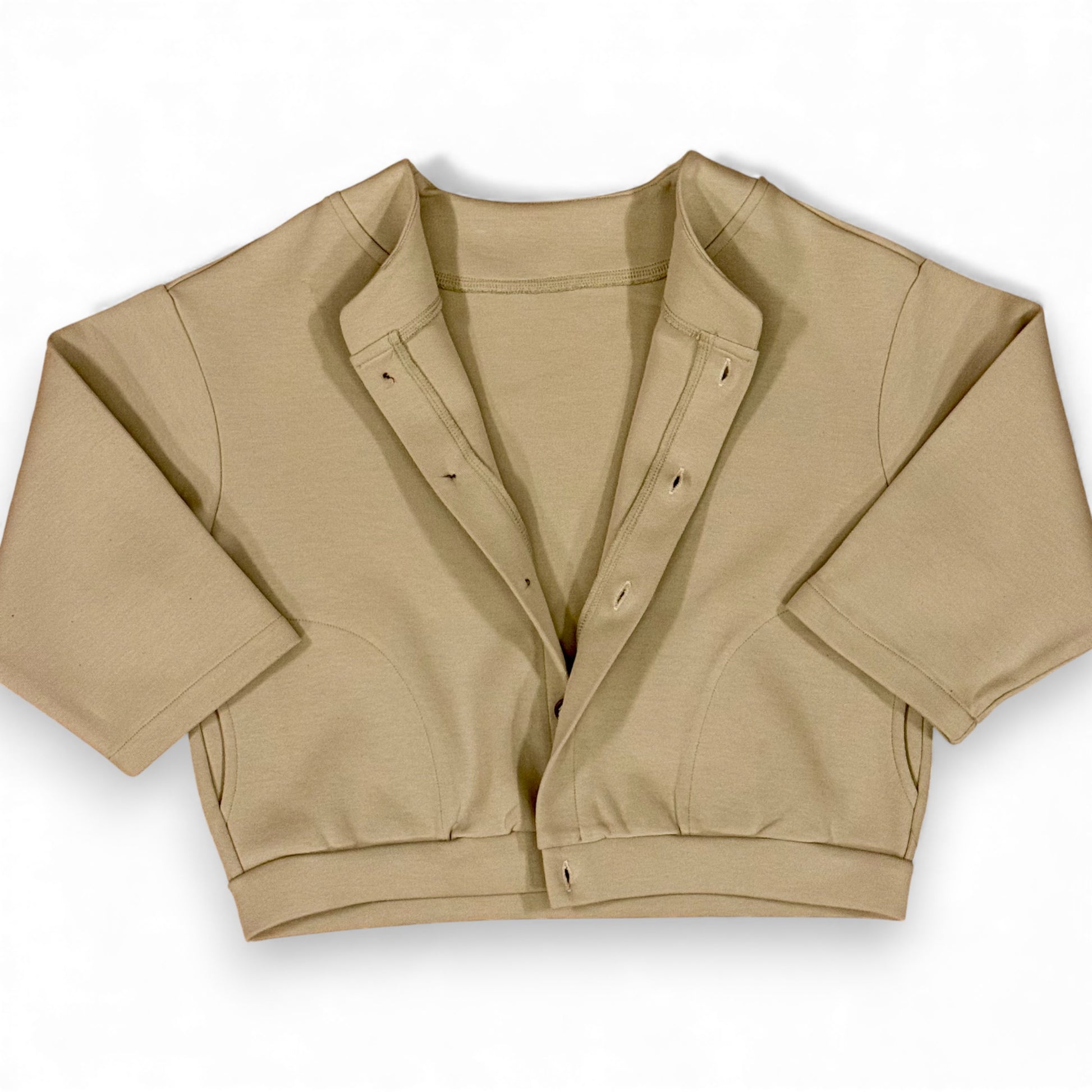 Folami Jacket in sand — back view with boxy silhouette and clean hem