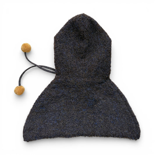 Back view of children’s wool hooded shoulder cape with extended shoulder coverage, designed as a warm under-coat layering piece.