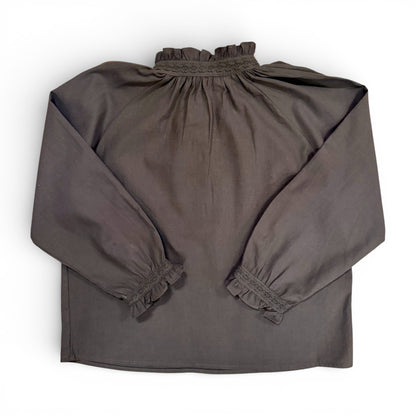 Back view of Etta Blouse in slate grey showing loose volume and gathered neckline