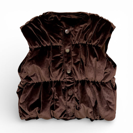 Ida Gilet with cap shoulders and tiered silhouette in chocolate velvet by That’s Not Fair London. Showing elasticated panels and subtle gathering, children’s velvet gilet.