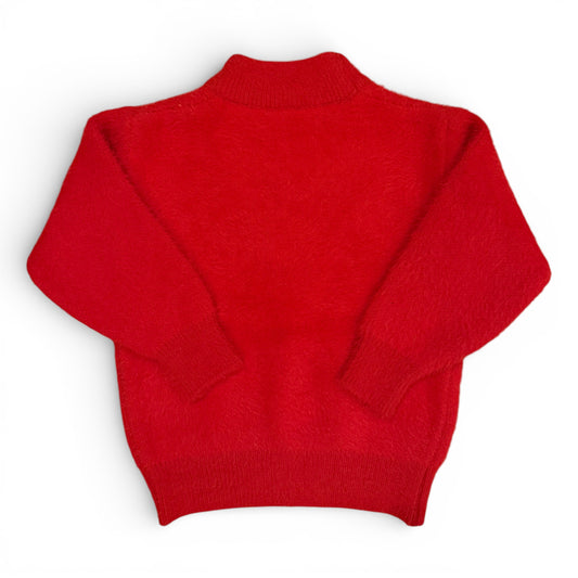 Back view of red mohair children’s jumper with drop shoulders and ribbed hem