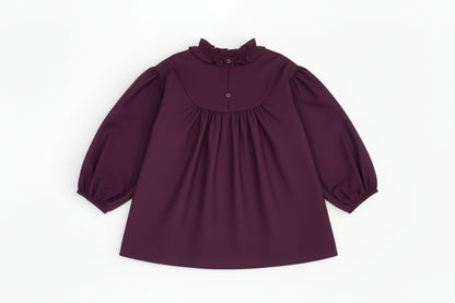 Back view of Riva Blouse showing button fastening.