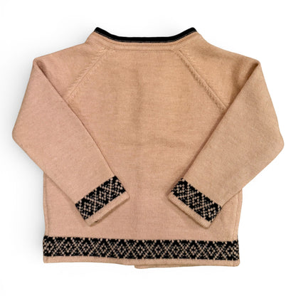 Back view - Children’s knitted cardigan with raglan sleeves, contrast patterned trim and button front