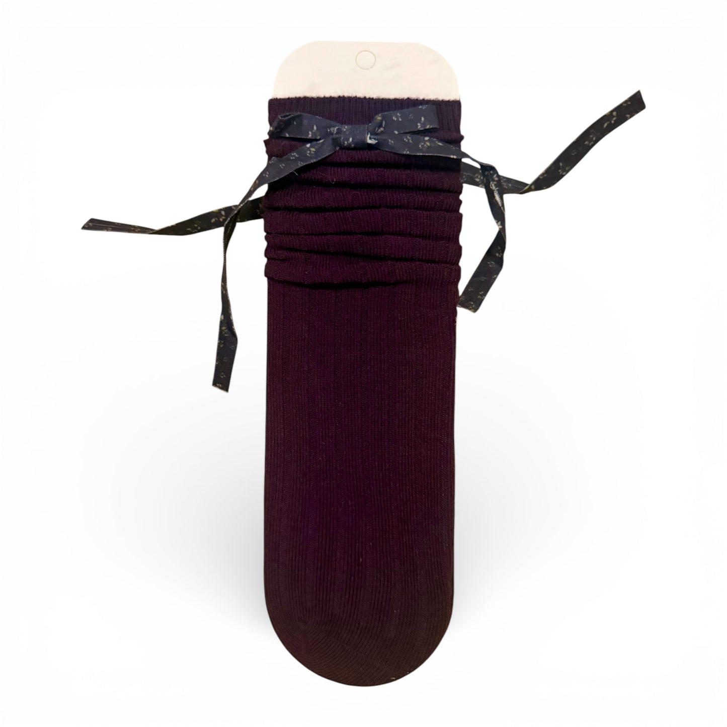 Ribbed children’s sock with cotton paisley bow detail, un-heeled design