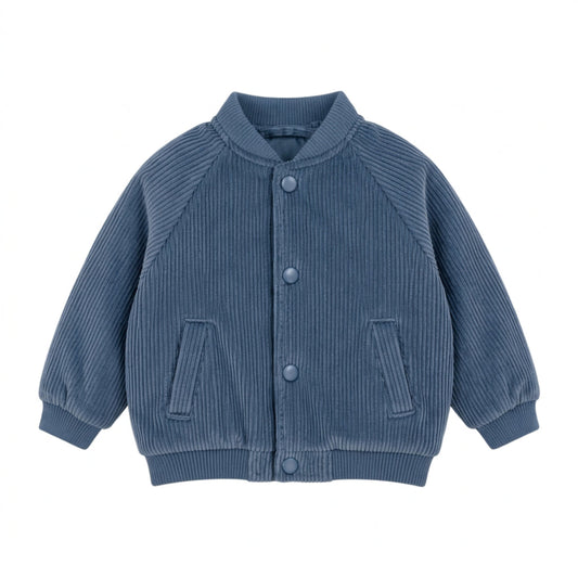 Jinny Varsity by That’s Not Fair London, teal blue ribbed velour children’s jacket with raglan sleeves, button front, ribbed collar, cuffs and hem, and slanted welt pockets.