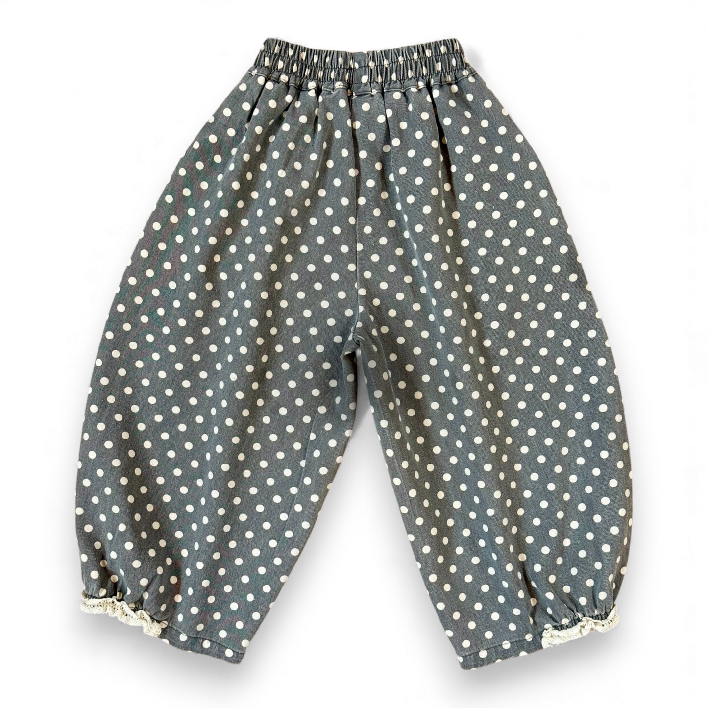 Kehinde Pantaloons in Charcoal Polka Dot – wide-leg cotton denim with lace cuff and elastic waist.