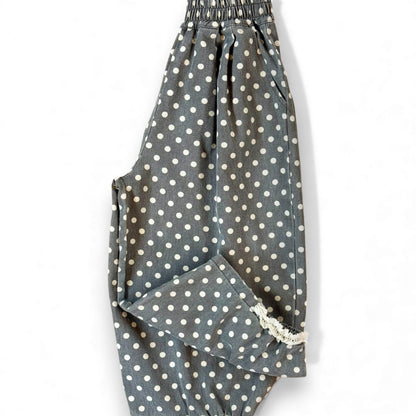 Kehinde Pantaloons in Charcoal Polka Dot – wide-leg cotton denim with lace cuff and elastic waist.